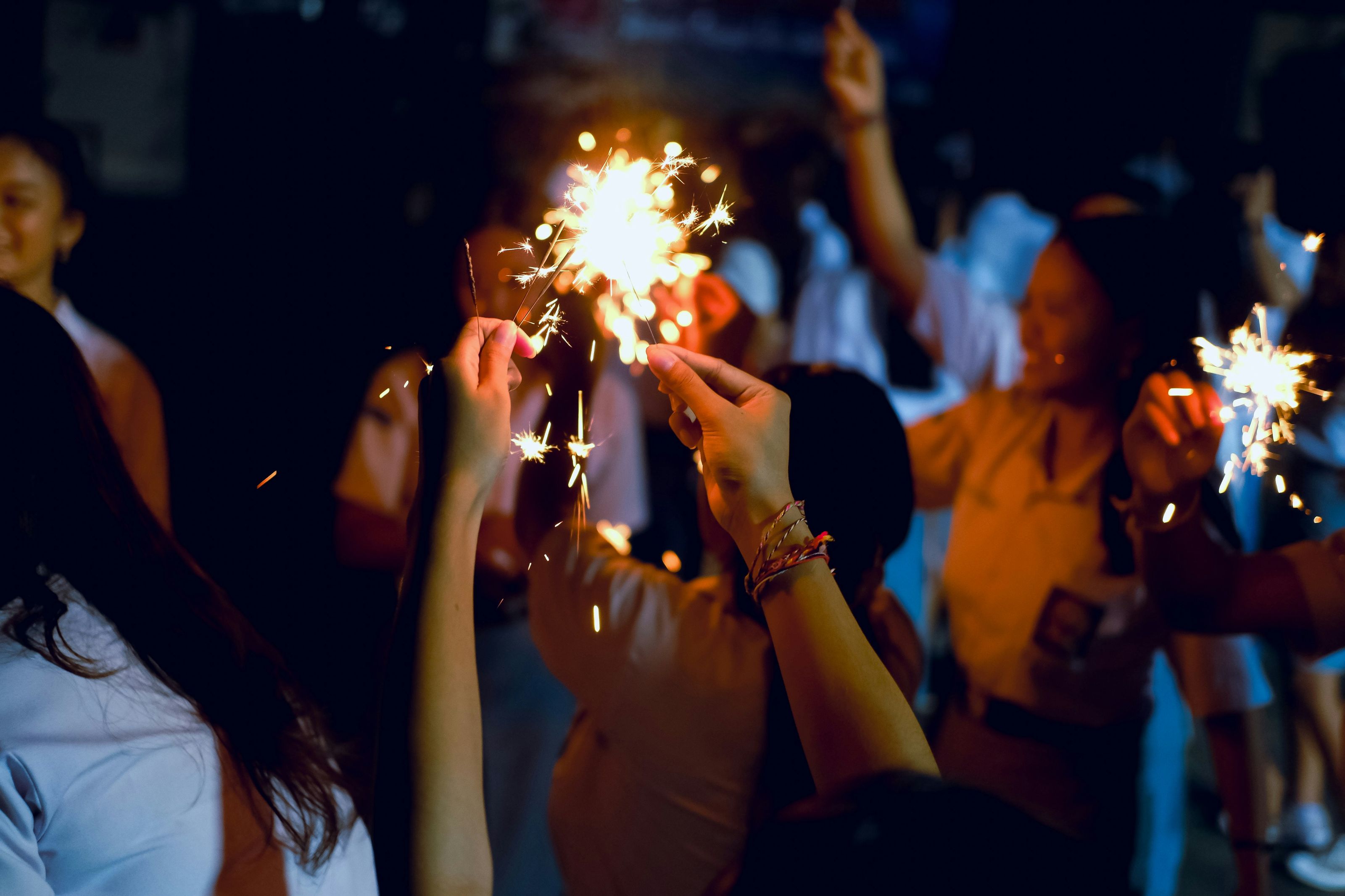 People celebrating with sparklers